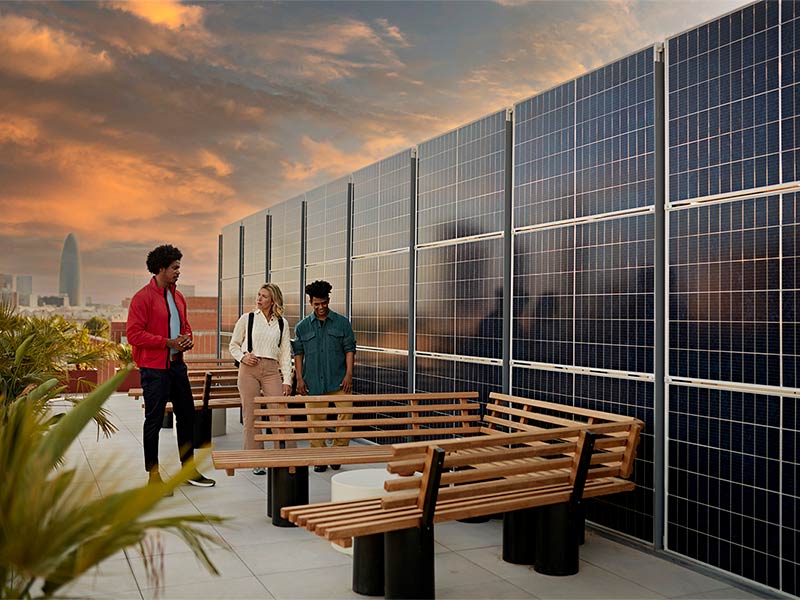 Group of people having a conversation on a rooftop