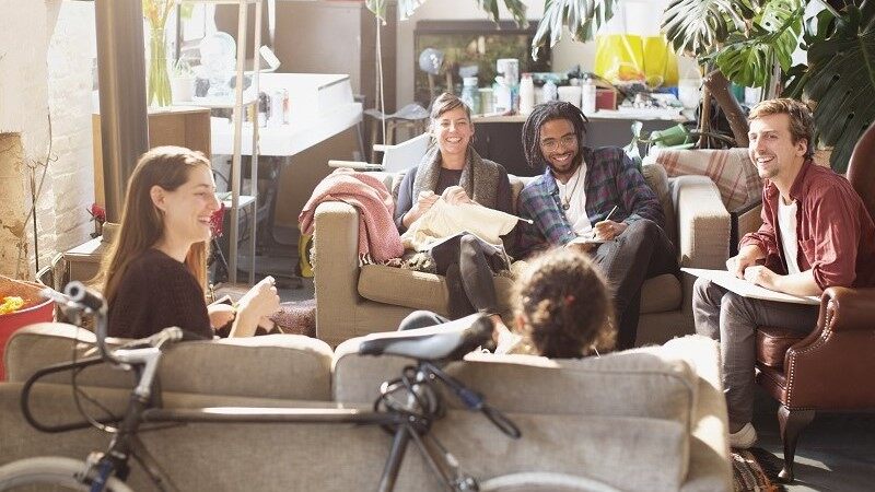 Students sitting and talking in the shared accomodation