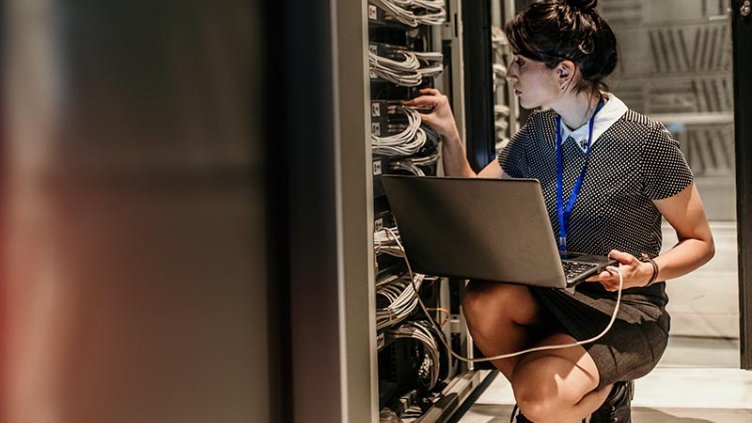 Women working on a server
