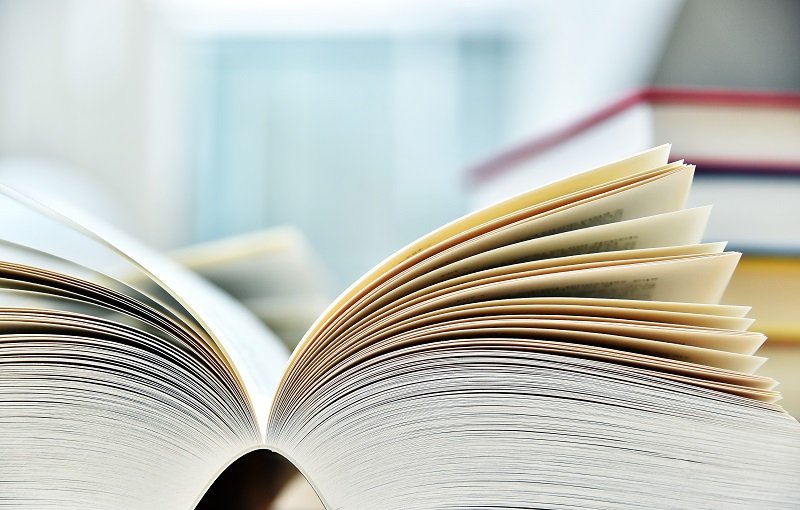 Books lying on the table in the public library.