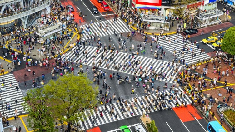 Tokyo, Japan view of Shibuya Crossing, one of the busiest crosswalks in the world.