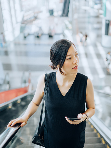 girl on escalator stairs