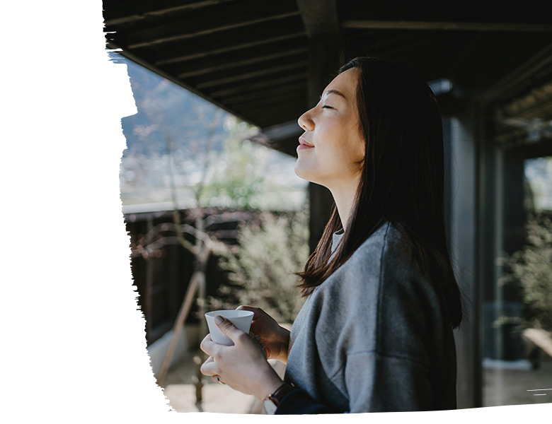 Girl having a cup of coffee