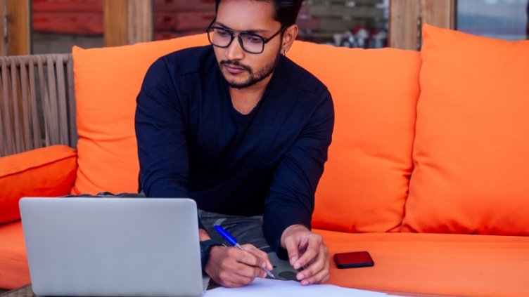 View of a man working in JLL office passionately