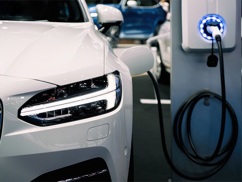 Electric car at charging point