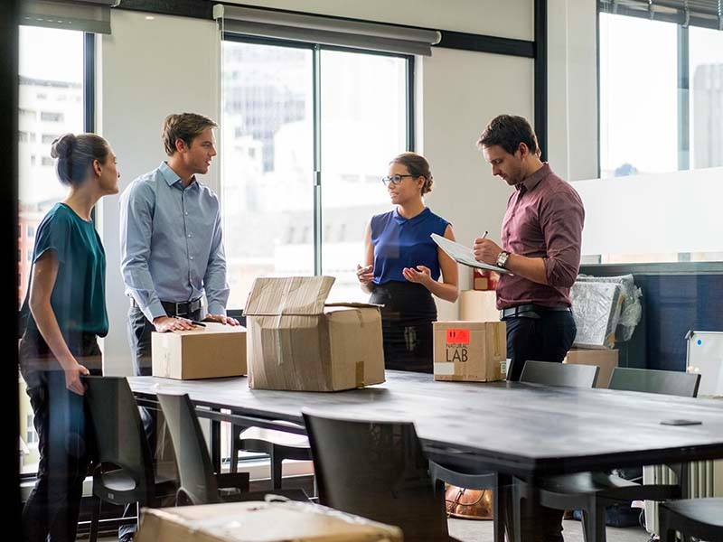 People and boxes in an office