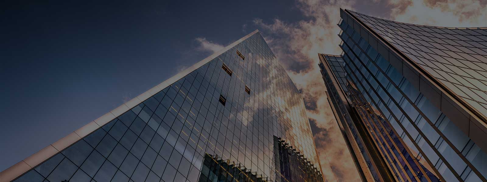 Highly detailed abstract wide angle view up towards the sky in the financial district of London City and its ultra modern contemporary buildings with unique architecture.