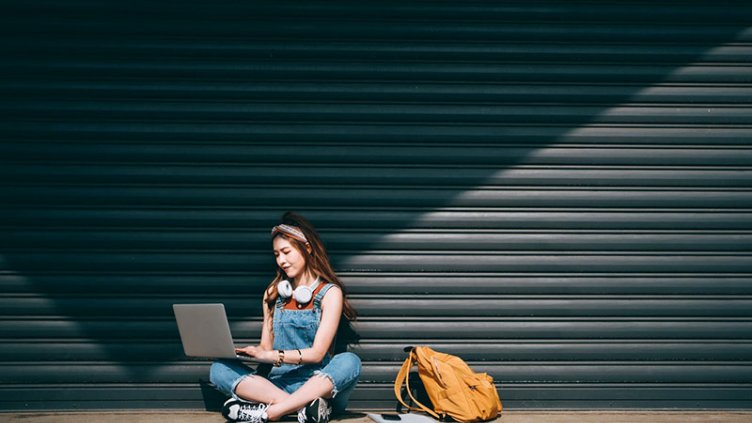 A woman working in a laptop