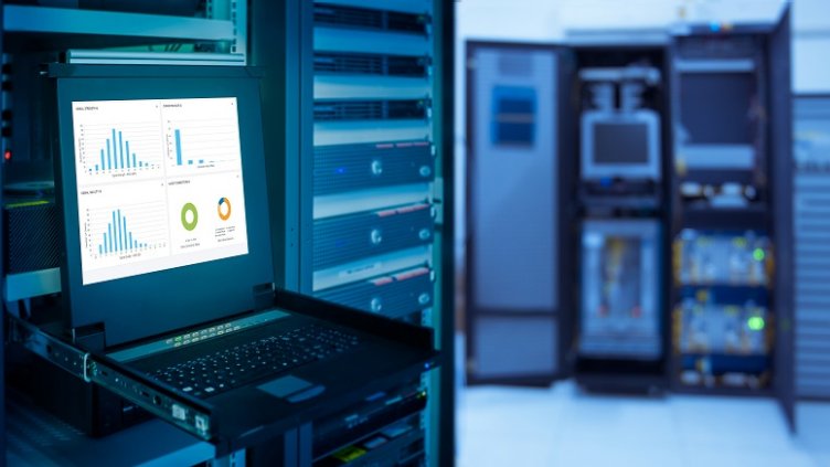 monitor show graph information of network traffic and status of device in server room data center and blur background